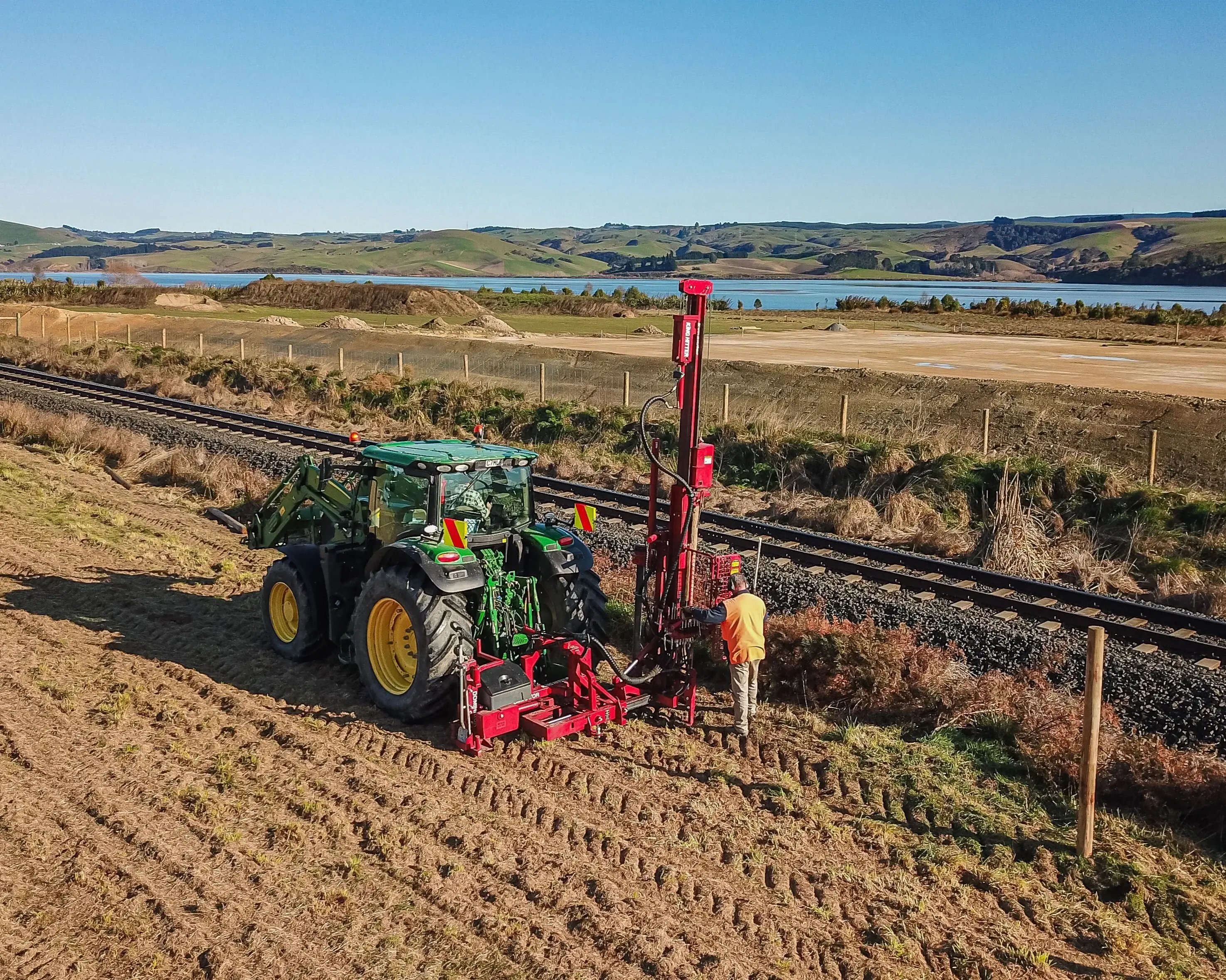 Aerial view of Kinghitter Active Safety System in use on farm fencing job